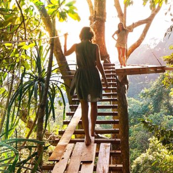 Lady on a rope bridge